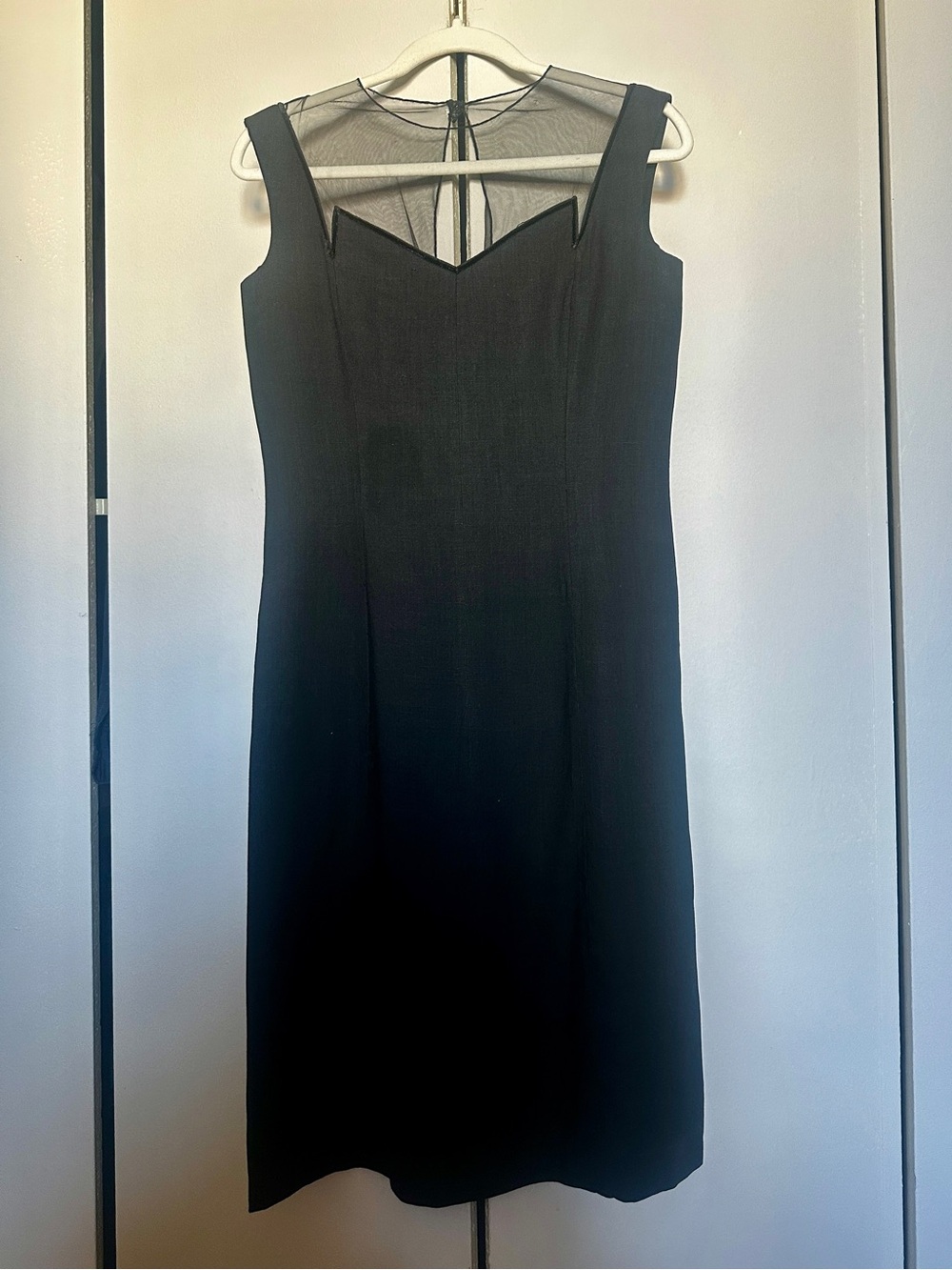 Classic Black Sleeveless Sheath Dress with Illusion Neckline